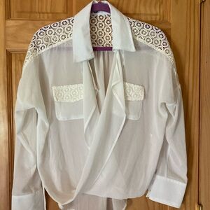 XOXO Size M see through long sleeve criss cross high low blouse